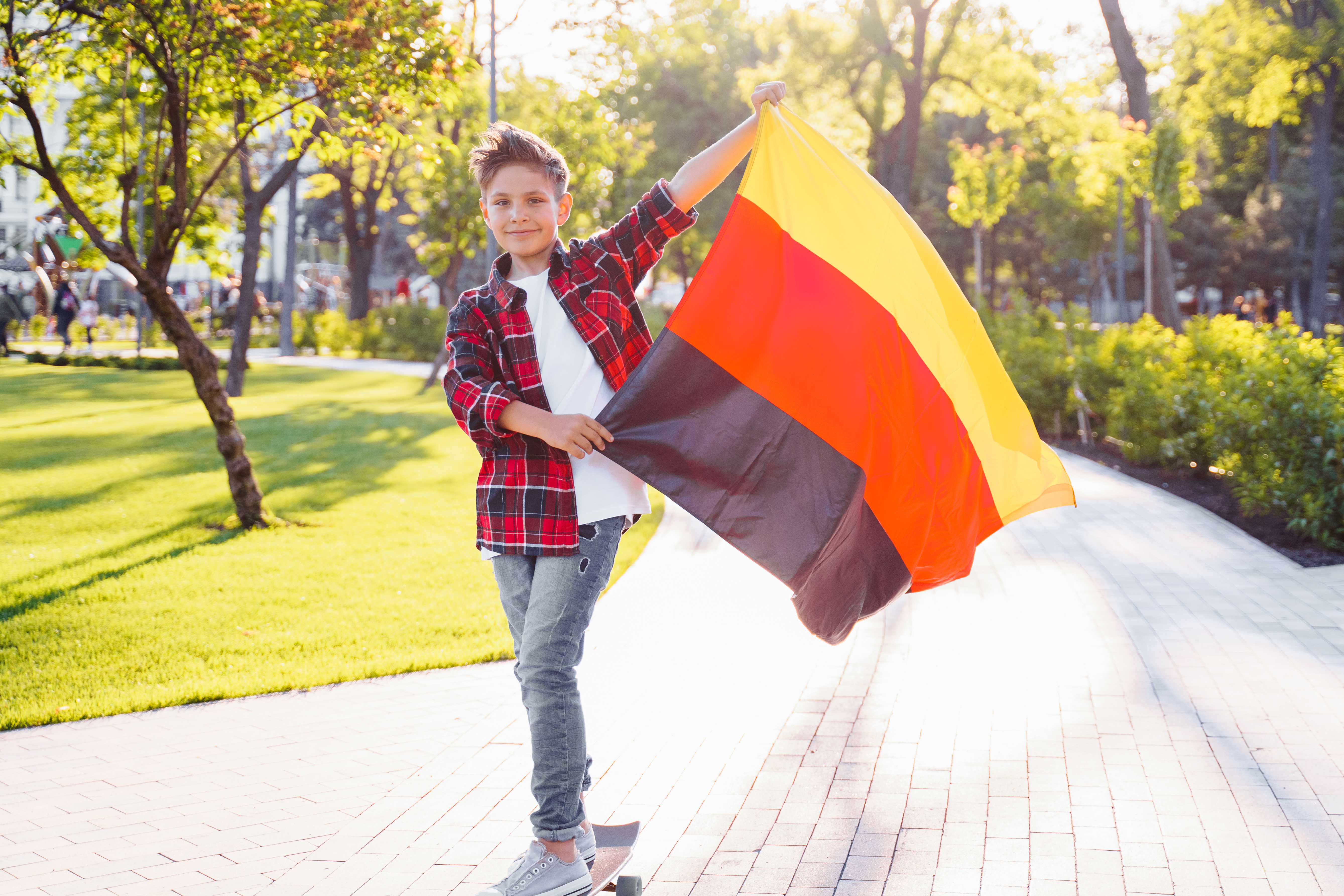 Мальчик с флагом Германии